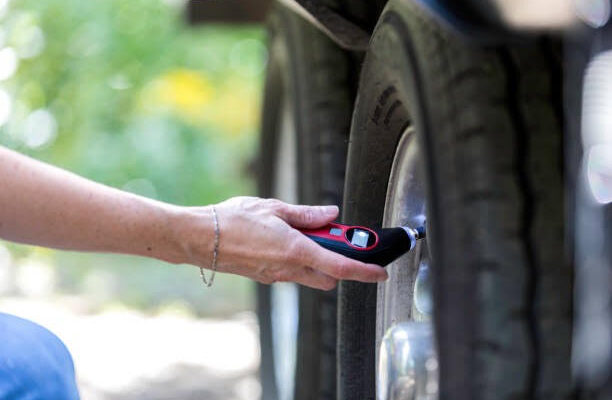 Caravan tire being checked